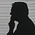 Silhouette of two people talking