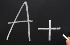"A+" written on chalkboard