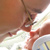 Boy and baby noses touching