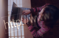 Woman on laptop and "http://www" 