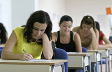 Students in a classroom writing