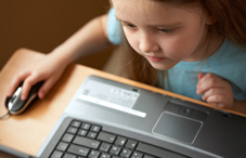 Young girl on a computer