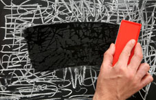 Someone erasing a chalk board