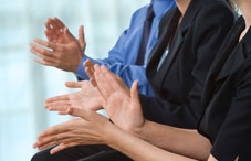 A few people clapping