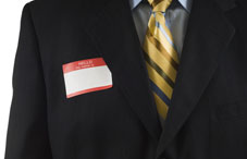 "Hello! My name is" sticker on a suit jacket