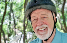Active senior wearing bike helment