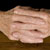 Pair of elderly hands together