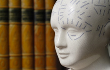 Human head figure with writing on it