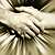 Shaking hands with gold background 