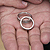 Hand holding wedding rings