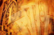 Twenty dollar bills with orange overlay