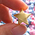Hand holding picked star