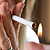 Closeup of woman lighting a cigarette