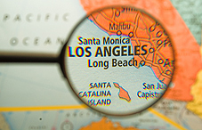 Magnifying glass looking at a map