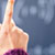 Person raising a finger