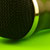 Microphone on green background
