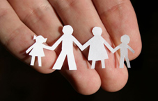 Paper family on hand