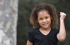 Girl showing strength