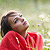 Student daydreaming in field