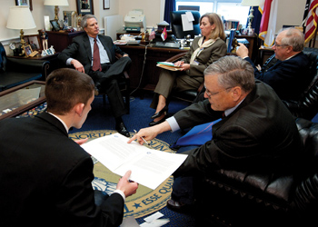 Clockwise from Jones, Dr. Nancy Laney; Dr. Jim Hilke; Dr. Charlie Cooper; and Brandon Lyon, legislative assistant with Rep. Walther B.Jones(credit: APA photo)