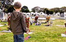 Child at cemetery