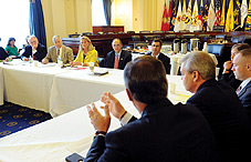 A meeting with members of the House Veterans Affairs Committee focused on innovative strategies for reducing suicide risk in military service members and veterans. From left to right: Rep. Tim Walz (D-Minn.), Rep. Michael Michaud (D-Maine), Rep. Ann Marie Buerkle (R-N.Y.), Rep. Phil Roe (R-Tenn.), Rep. Gus Bilirakis (R-Fla.), Dr. Janet Kemp, Dr. Craig Bryan, Dr. David A. Jobes and Dr. M. David Rudd. (credit: Lloyd Wolf)