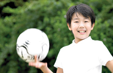 Boy playing soccer
