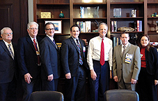Left to right, Dr. Bruce Nystrom, Dr. David Hill, Dr. Adam Buhman-Wiggs, Dr. Aaron Harris, Moran, Dr. Jason Deselms and Dr. Monica Kurylo