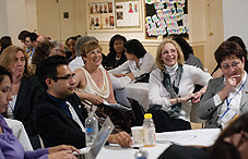 Conference attendees in debriefing with Government Relations Office staff