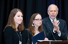 During the APA Council of Representatives meeting, APA President Dr. Donald N. Bersoff gave a presidential citation to Katy Sherlach and Maura Schwartz, the daughters of school psychologist Mary Sherlach, who was killed during the Newtown, Conn. shooting. The citation honored Mary Sherlach for “going above and beyond in her role as a school psychologist” and putting herself in danger “to protect the children she cared so much about.” (credit: Charles Votaw) 