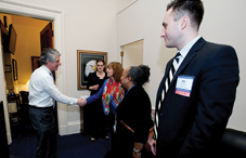 Dr. Cathleen Rea, federal advocacy coordinator for the Virginia Psychological Association, shakes hands with Rep. Scott Rigell (R-Va.) before meeting with a staff member to stress the importance of making psychologists eligible for incentive payments to adopt electronic health records. From left to right: Rep. Rigell, staffer Abby Gunderson, Dr. Rea, Dr. Carolyn Sahni and Dr. Paul Perrin.