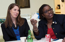 Dr. Andrea Kozak Miller and APAPO Board of Directors member Dr. Jennifer Kelly share information from their meeting with Rep. John Lewis (D-Ga.) with APA Practice Organization Government Relations staff at the Capitol Hill visit debriefing.