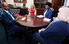 Leaders from the Illinois Psychological Association meet with a staff member from the office of Rep. Danny Davis (D-Ill.).