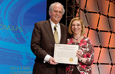 APA President Dr. Nadine Kaslow presents a presidential citation to Dr. David Barlow, founder and director emeritus of the Center for Anxiety and Related Disorders at Boston University.