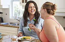 You are more likely to serve and eat unhealthy foods when you're near someone who is overweight.