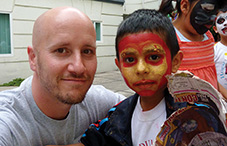 Dr. Jason Platt and a child participating in an annual camp designed to enhance self-esteem, build confidence and increase resiliency in Mexican youth. The annual day camp is hosted at Alliant International University’s Mexico City campus.