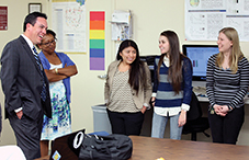California State University, San Bernardino, psychologist Dr. Cynthia Crawford — second from left with undergraduates Mirella Hernandez and Kristi Shawhan and graduate student Lace Riggs — gives U.S. Rep. Pete Aguilar (D-Calif.) a tour of the university’s College of Social and Behavioral Sciences lab in February. Crawford and her students discussed the importance of federally funded student development programs for underrepresented and low-income students.