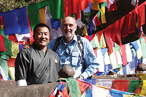 Bhutan volunteer Dr. George Burns with Wangchuk, a volunteer substance-abuse counselor.