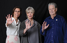 Showing the five signs: Dr. Barbara Van Dahlen, Melinda Wilson and Brian Wilson are increasing awareness of mental health issues. (credit: Lloyd Wolf)