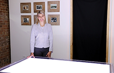 Dr. Mariana Figueiro of Rensselaer Polytechnic Institute with the table she invented to provide light therapy to dementia patients. (credit: Rensselaer Polytechnic Institute)