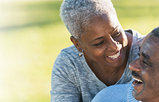 Staying active socially despite health-related challenges may help lessen the decline in well-being in late life