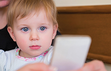 Caregivers whose eyes wander during playtime — due to distractions such as smartphones or other technology