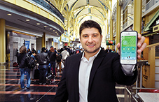 Dr. Daniel Gartenberg using his app at Washington Reagan National Airport. (credit: Lloyd Wolf)