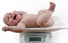 Infants born into families that speak tonal languages have more melodically complex cries