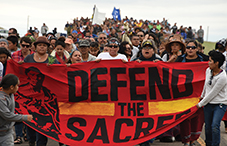 In September, American Indians marched to a burial ground sacred site that was disturbed by bulldozers building the Dakota Access Pipeline.