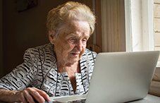 Senior woman using laptop