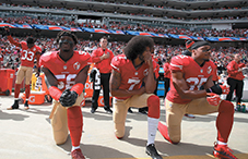 San Francisco 49ers Eli Harold #58, Colin Kaepernick #7 and Eric Reid #35 take a knee before the Oct. 2, 2016, game against the Dallas Cowboys at Levi’s Stadium in Santa Clara, California.
