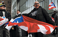 Activists protesting lack of aid to Puerto Rico.