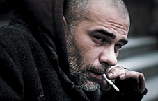 Homeless man smoking