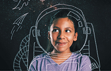 Girl dreaming of being an astronaut